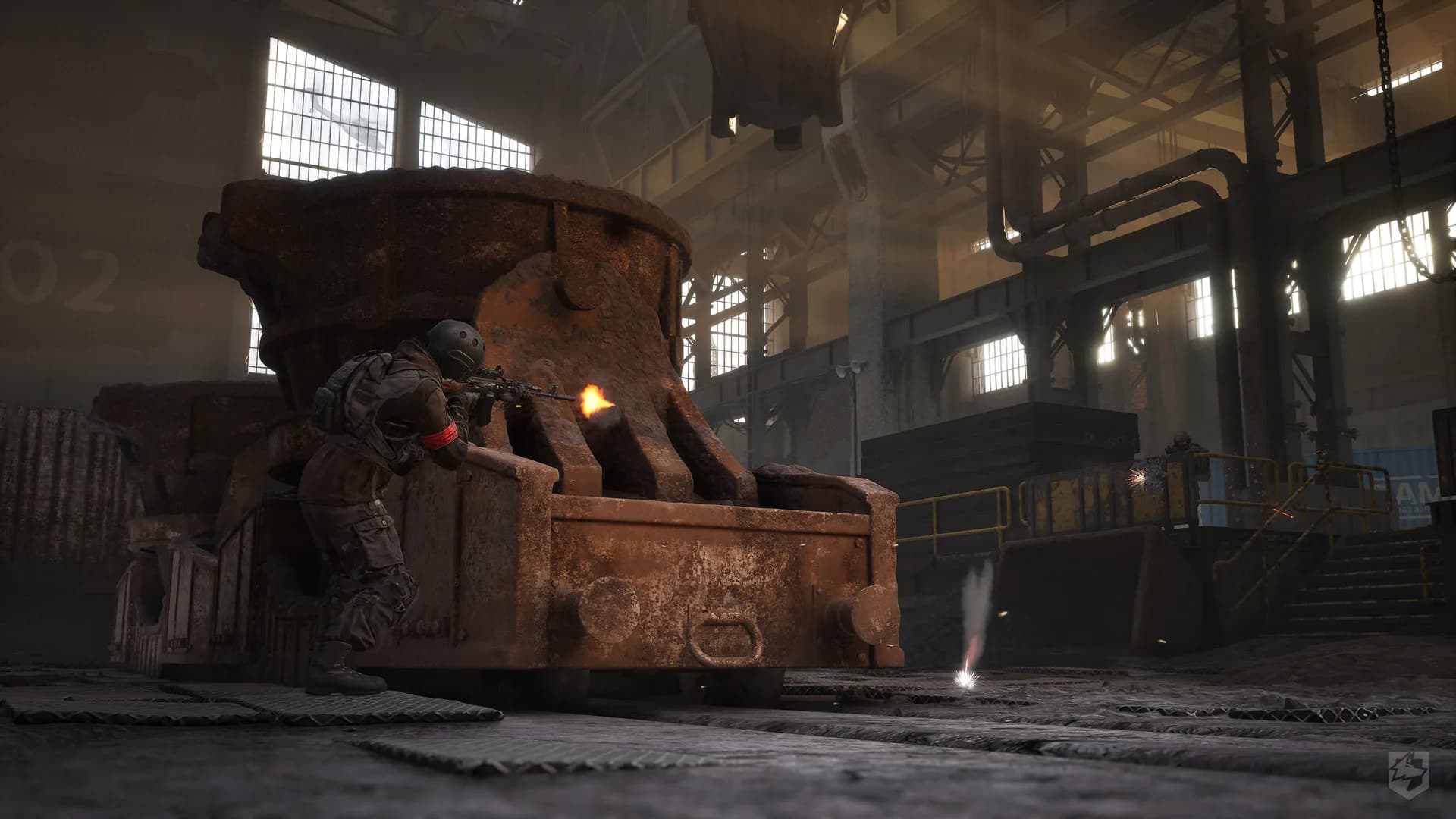 Official WARDOGS screenshot of a soldier moving through an industrial foundry.