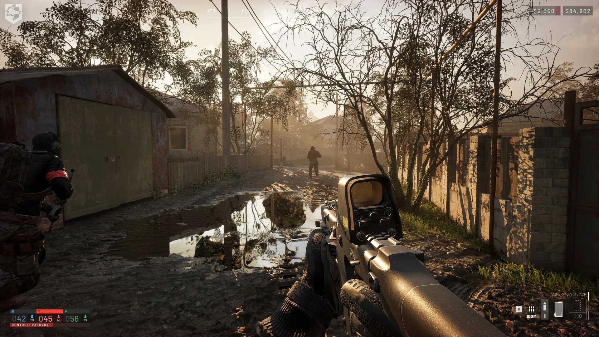 Official WARDOGS screenshot of infantry moving along a residential street with rifles.