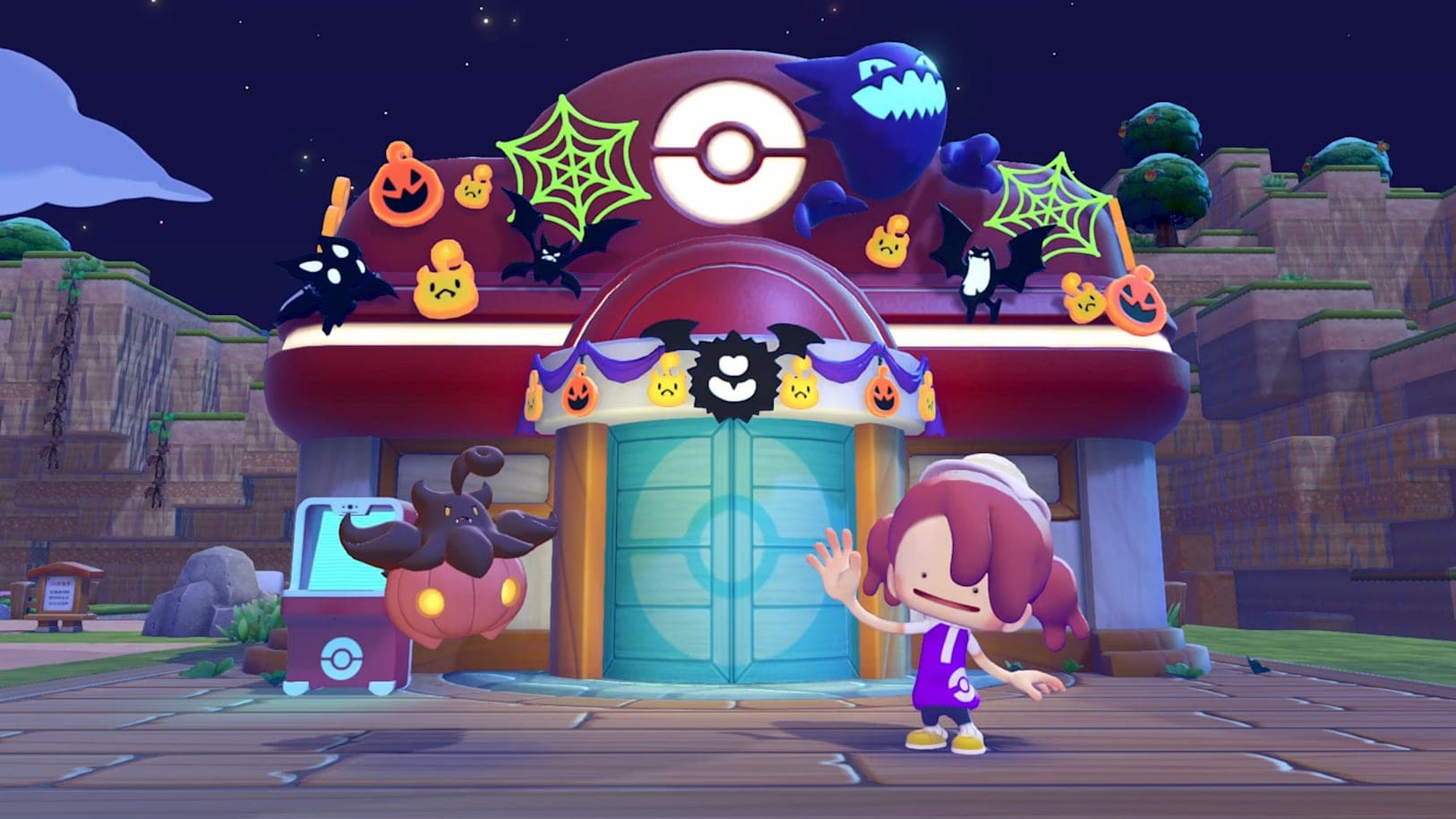 Pumpkaboo stands near a decorated Pokemon Center.