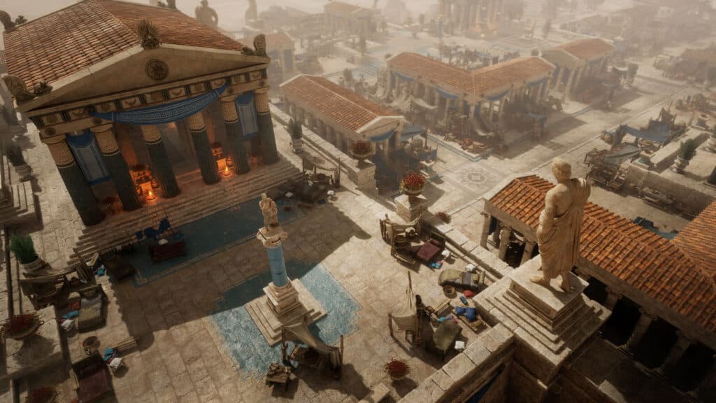 An overhead view of a sunlit settlement with tiled roofs and a statue.