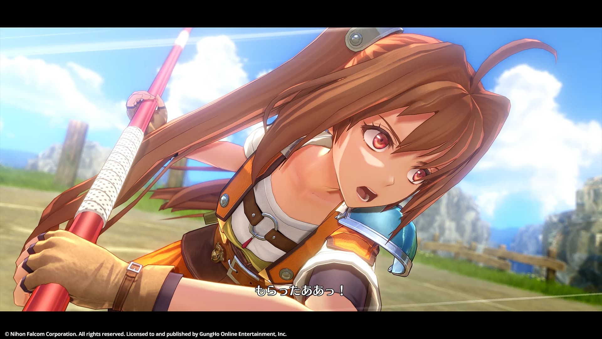 Estelle holds her staff during a close-up battle scene, with Japanese subtitles and publisher credit along the bottom.
