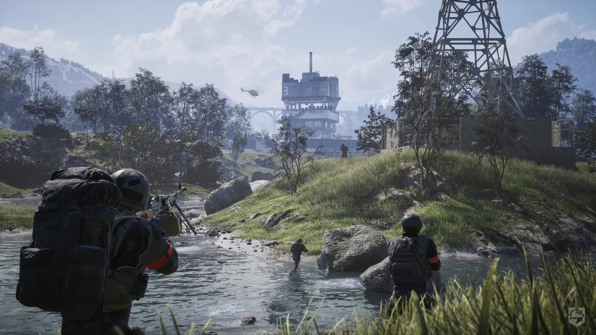 Official WARDOGS screenshot of soldiers crossing a wide river beneath a damaged tower.